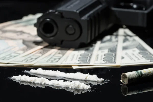 Illegal drugs , money and guns — Stock Photo, Image