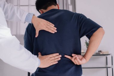 Physiotherapist working with patient in clinic. closeup Rehabilitation physiotherapy concept