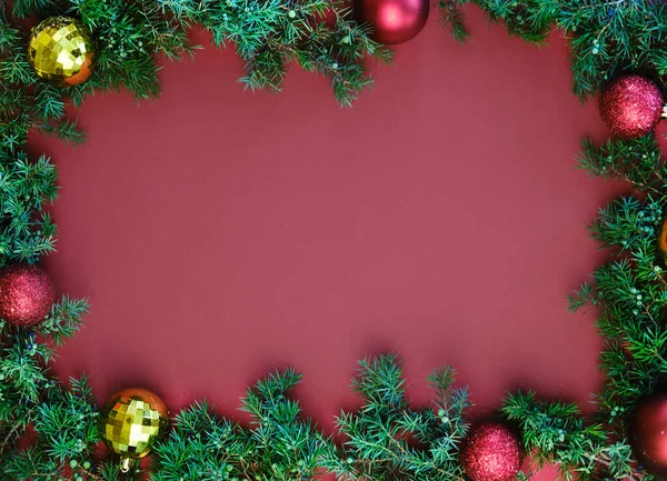 Festive background with copy space for text. Christmas border of fir branches and balls. Flat lay, top view — Stock Photo, Image