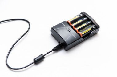 Battery charger with batteries clipart