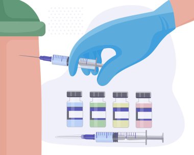 Çeşitli hastalıklara ve koronavirüs KOVID-19 'a karşı düzenli aşılar yapılıyor. Doktor, hastanın koluna bir doz aşı enjekte eder. Antiviral iğne. Virüslere karşı güvenli koruma.