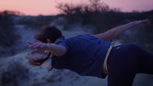 Woman Practicing Yoga Dunes Sunrise Balancing Feet Footage Slow Motion — Stock Video