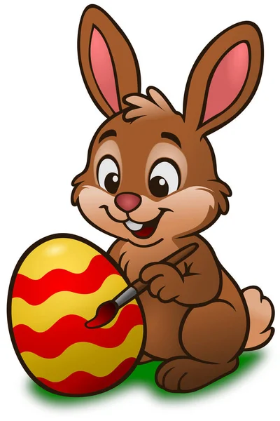 Tavşan Paskalya yumurtası boyuyor.