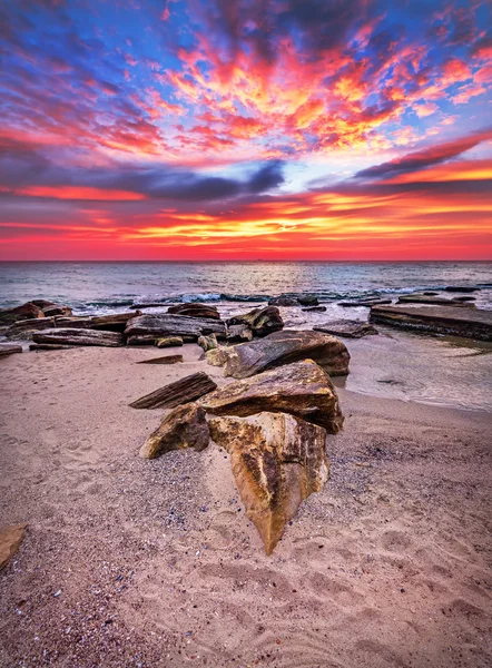 Color on the rock in sunrise present line and colourful.