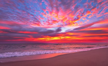 Evening sky with dramatic clouds over the sea. clipart