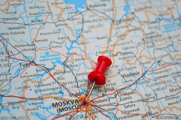 Image of a map with the city of Moscow marked with a red pushpin