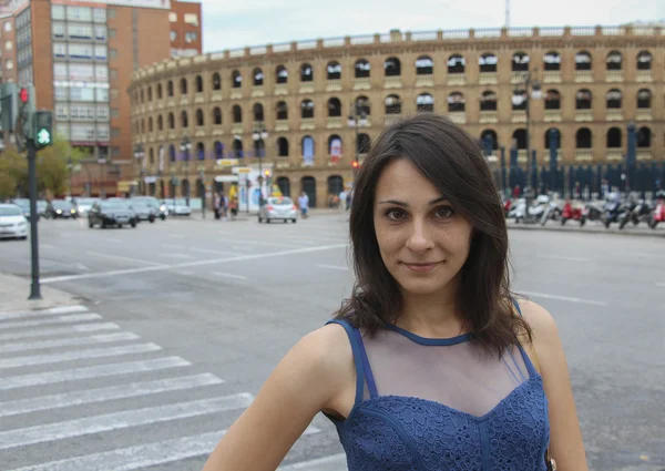 Girl on the background of bullring — Stock Photo, Image