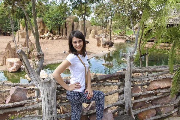 Girl on the background of animals and nature of biopark in Valencia — Stock Photo, Image