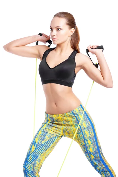 Sportovní trénink ženského modelu s zásob v módní sportwear. Studio natáčení. — Stock fotografie