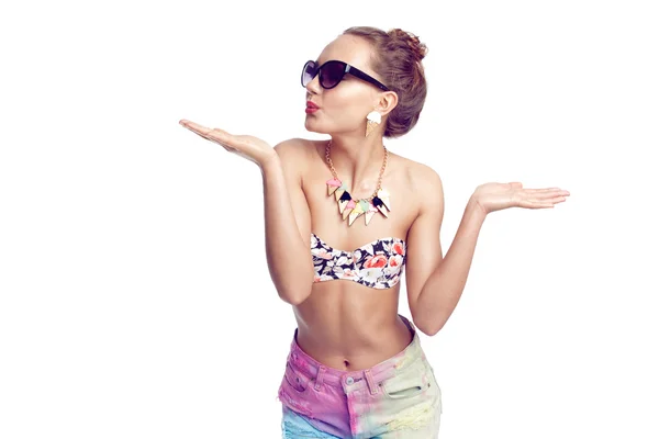Bright sunny model in a swimwear, shorts and sunglasses. White studio shooting — Stock Photo, Image