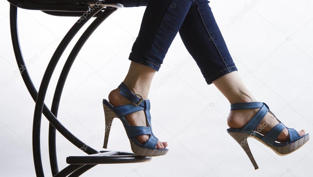 Jeans and high heeled shoes