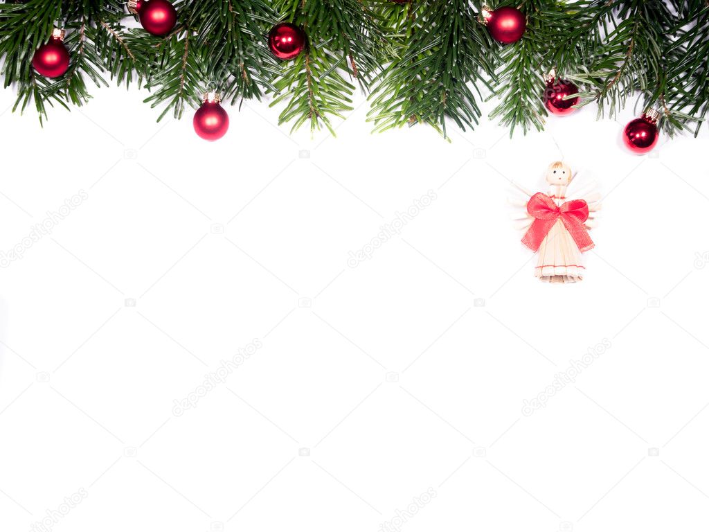 Isolated fir branches with Christmas tree balls and angel