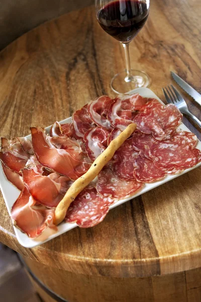 Ham, sausage and wine — Stock Photo, Image