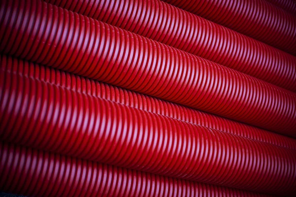 Red plastic pipes Stock Photo