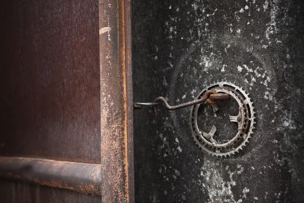 Hook and metal door — Stock Photo, Image