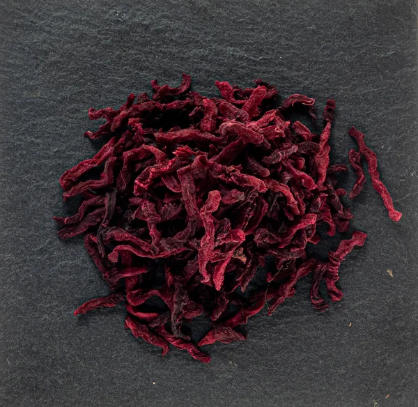 Dried red bright beets chopped, spices, macro photo — Stock Photo, Image