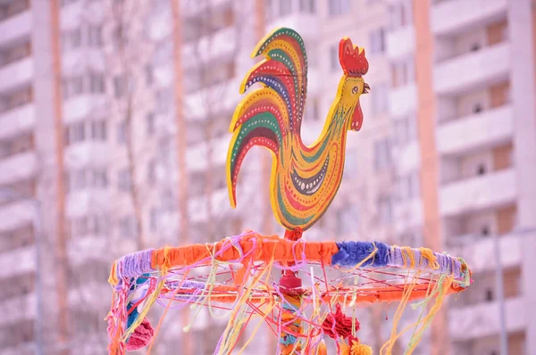 burning of effigies on the Russian traditional holiday Maslenitsa or Seeing off winter. a pot of porridge and butter and a bunch of mutton. Concept spring and festival