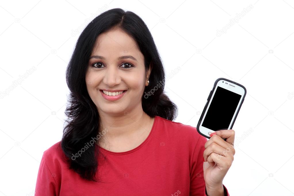 Young woman holding mobile phone 