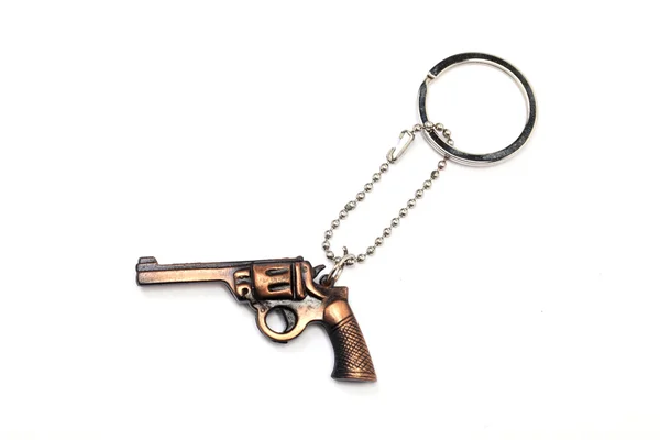 Toy gun with key chain — Stock Photo, Image