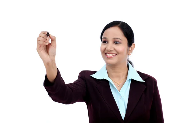 Business woman writing with pen on virtual scree — Stock Photo, Image