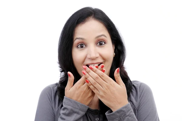 Young woman covering mouth with her hands — Stock Photo, Image