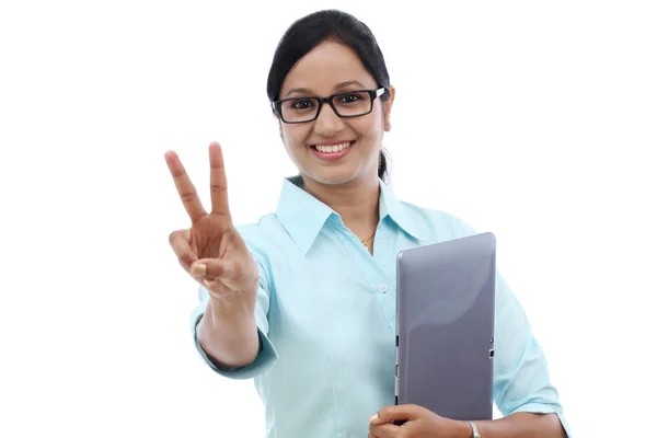 Happy business woman making victory gesture — Stock Photo, Image