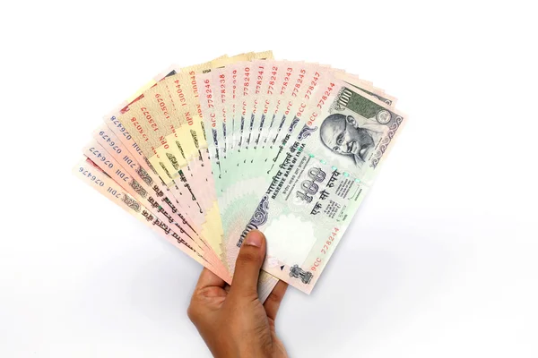 Рука холдингу Індійська валюти — стокове фото