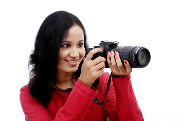 Young woman photographer taking images — Stock Photo, Image