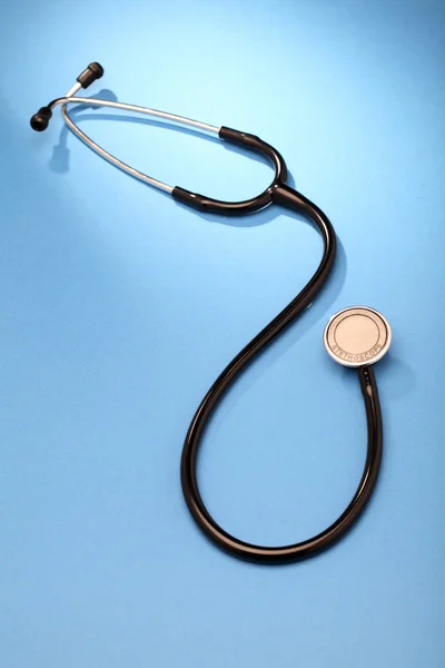 Stethoscope on blue — Stock Photo, Image