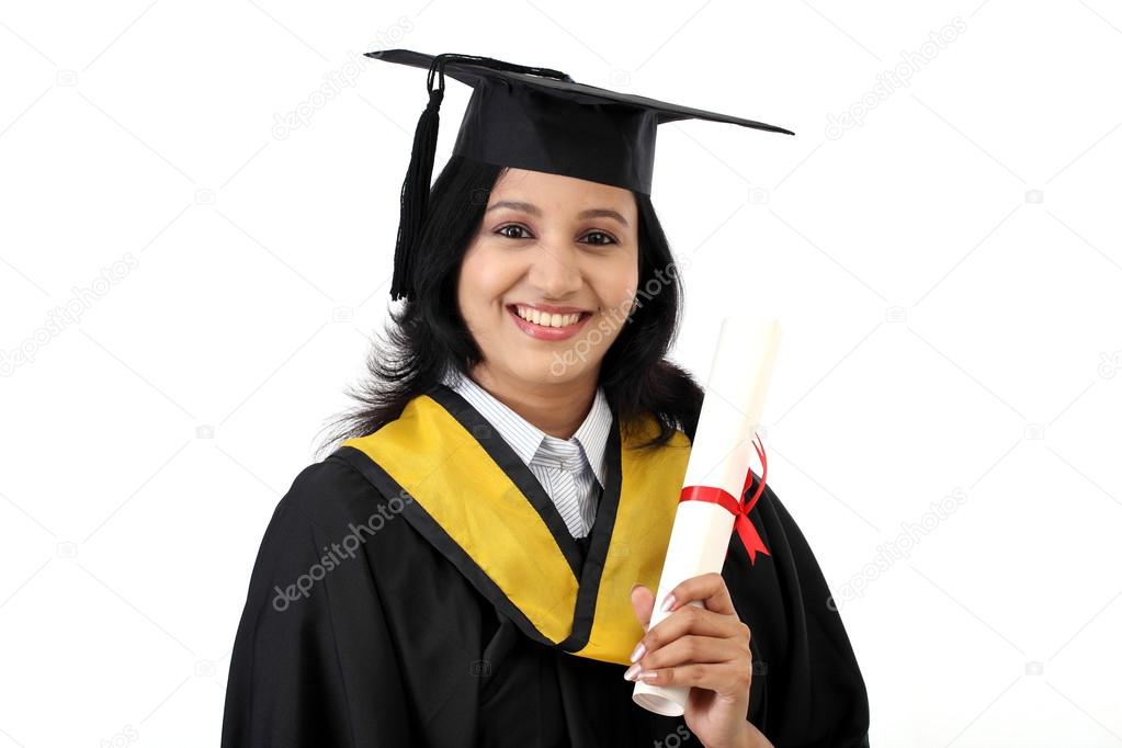 Happy young female student holding diploma 