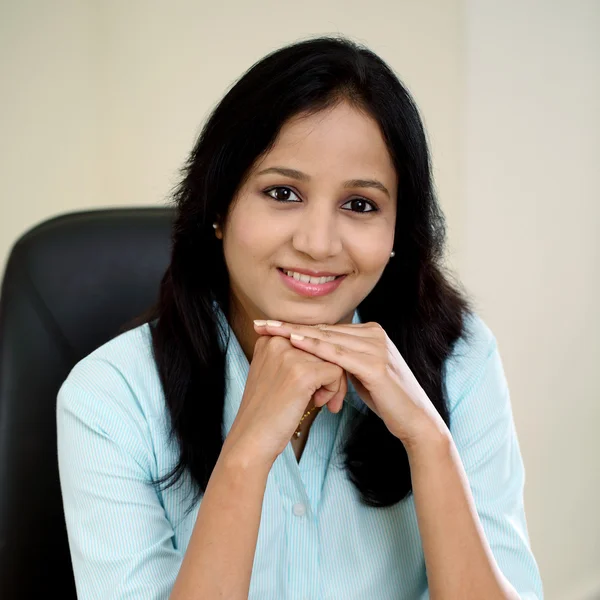 Confident young business woman at office — Stock Photo, Image