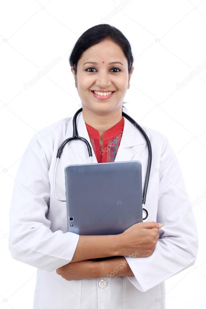Young female doctor with tablet