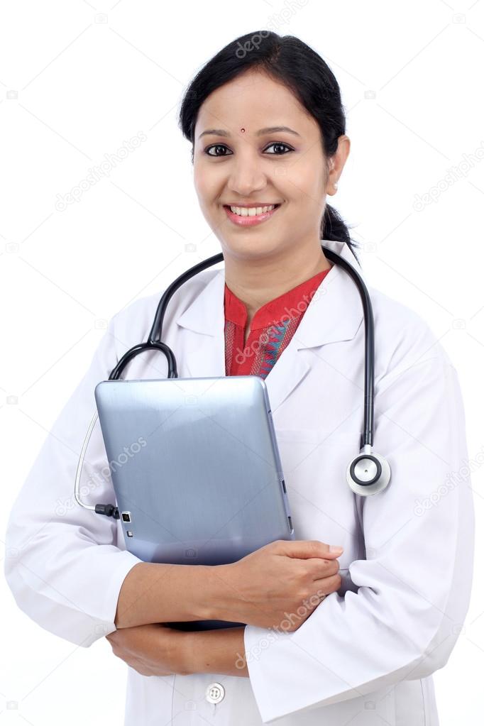 Young female doctor with tablet