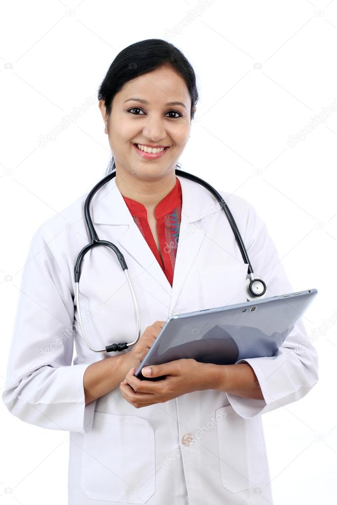 Young female doctor with tablet