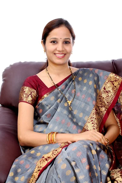 Indian Traditional woman sitting in sofa
