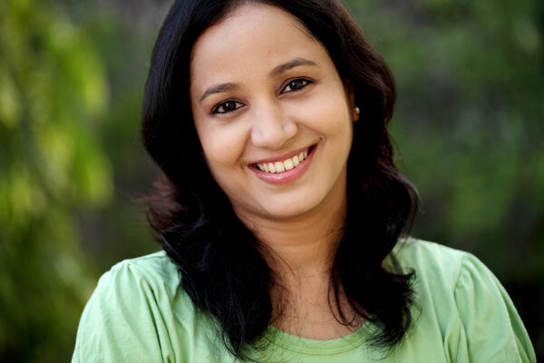 Portrait of young woman at outdoors