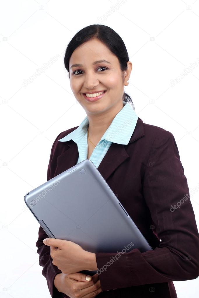 Happy young business woman with tablet