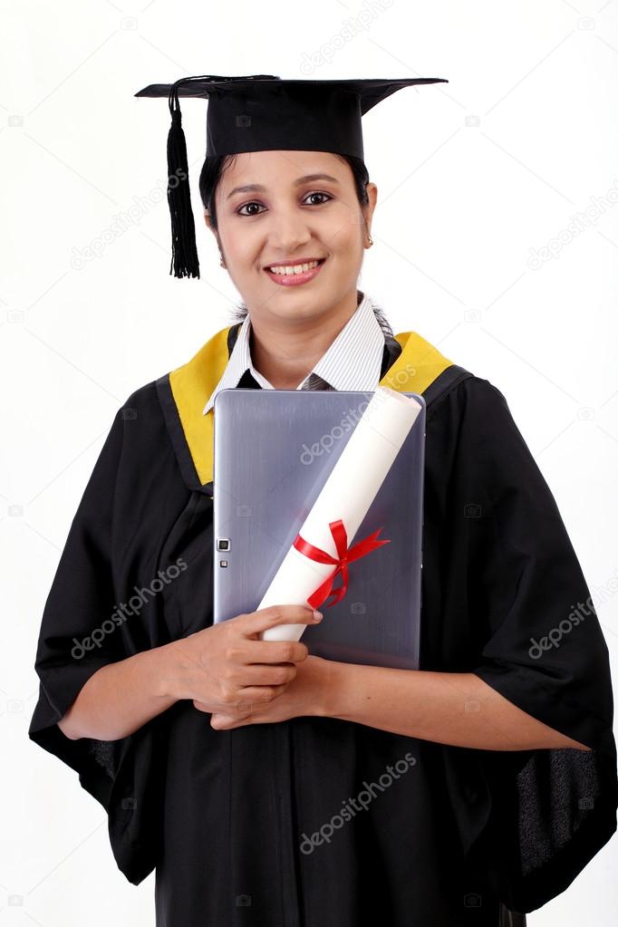 Young female graduated student using a tablet computer