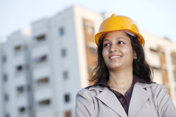 Confident female construction engineer