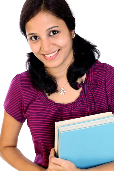 Young female student with books in hand — Stock Photo, Image