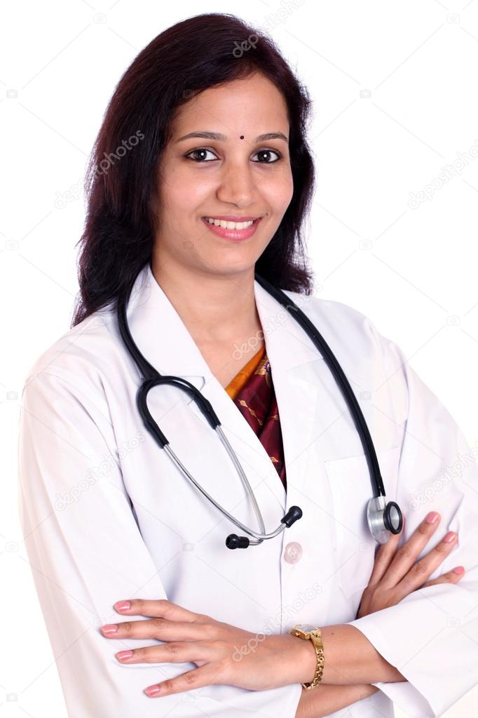 Smiling female doctor with arms crossed