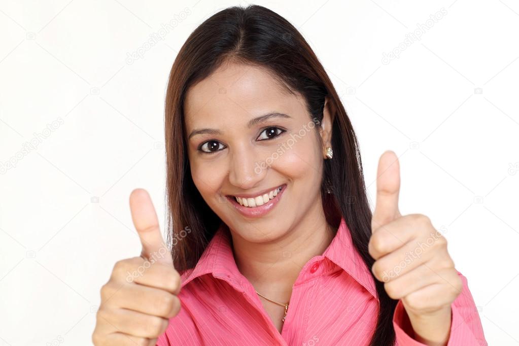 Business woman thumbs up gesture