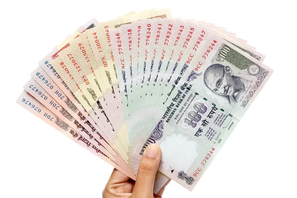 Ruky hospodářství indická měna — Stock fotografie