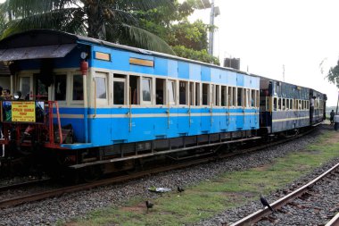 vintage steam engine locomotive train, Nilgiri Mountain Railway Ooty India clipart