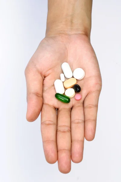 Hand with pills — Stock Photo, Image