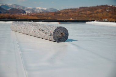 Geotextile for roof, covered with synthetic PVC membrane clipart