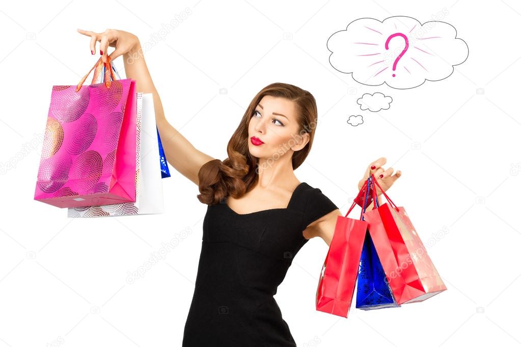 The beautiful haired, redhead girl chooses between purchases, with a question mark above his head
