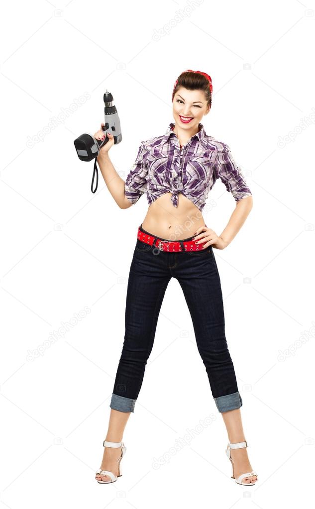 Rockabilly desperate housewife with cordless screwdriver, smiling and, ready for repair