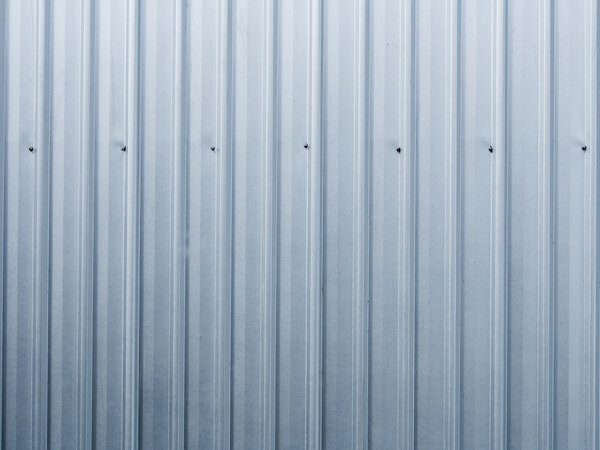 This is the corrugated iron wall of factory . Use for background