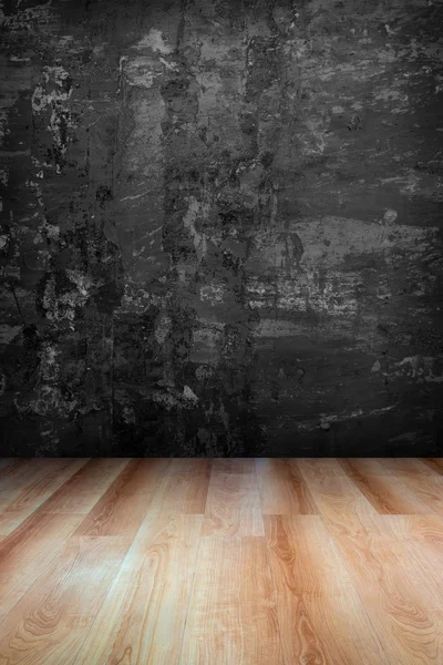 Grungy concrete wall and wooden floor — Stock Photo, Image